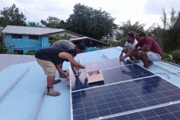 EESLI Small Grants Project recipient installing Solar PV panels